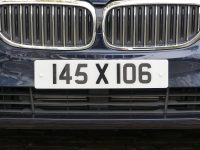 Car with number plate 145 X 106