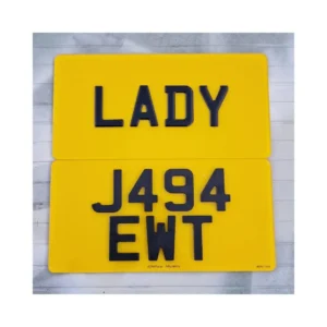 Comparison of a UK road-legal number plate and a printed show plate, highlighting key differences